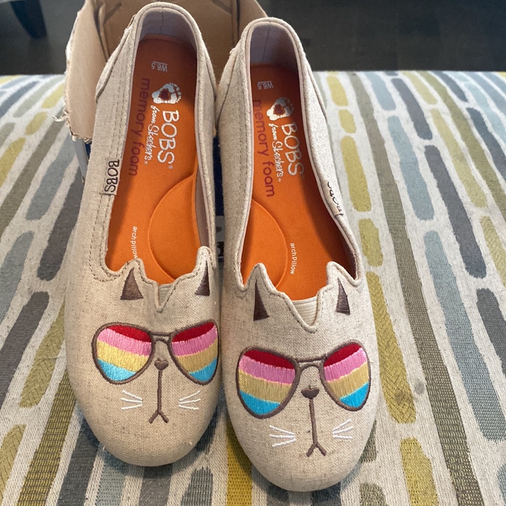 Brand new Bobs. Tan colored 6.5 women’s.